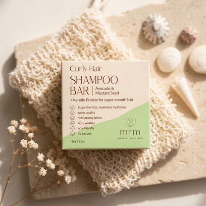 A boxed shampoo bar product labeled &